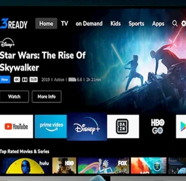 IPTV dashboard on a smart TV showing live channels and popular movies
